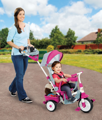 pink trike with parent handle