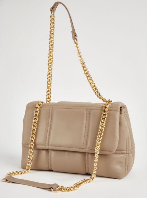 A tan handbag with a gold-tone chain.