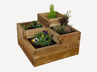 Wooden plant pot stack with four plants