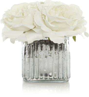 artificial flowers in glass vase