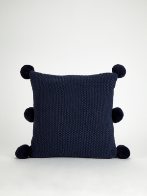 navy pom pom pillow