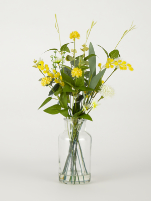 yellow artificial flowers in vase