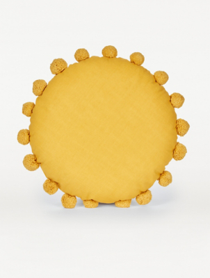 round ochre cushion