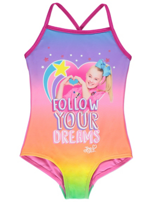 girl putting on one piece swimsuit