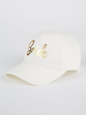 white and gold hat