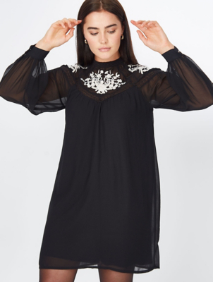 black dress with embroidered sleeves