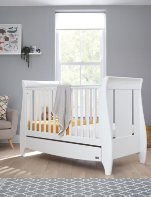 small grey cot