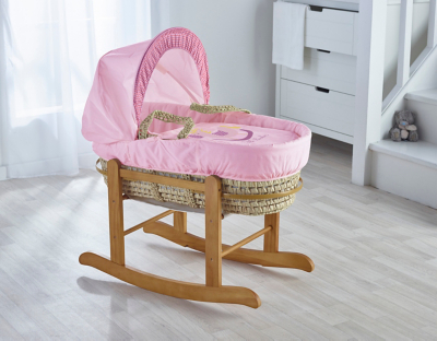 pink moses basket with rocking stand