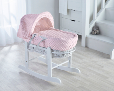pink moses basket with rocking stand