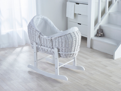 white wicker bassinet