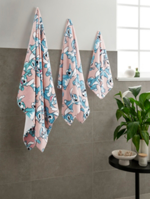 Disney Stitch Coral Printed Towel Range Home at ASDA