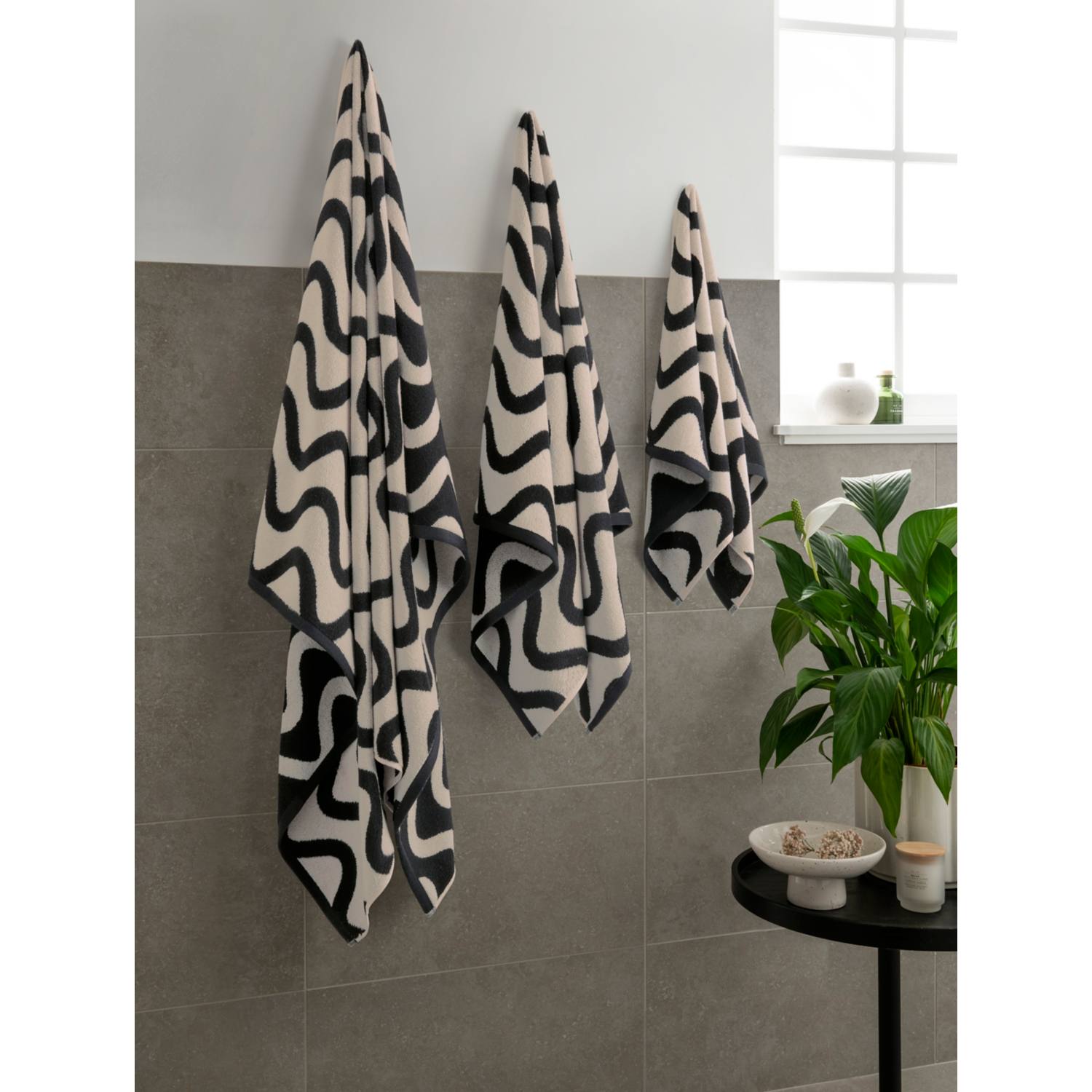 George Cream & Black Sculptured Wiggle Towel Range