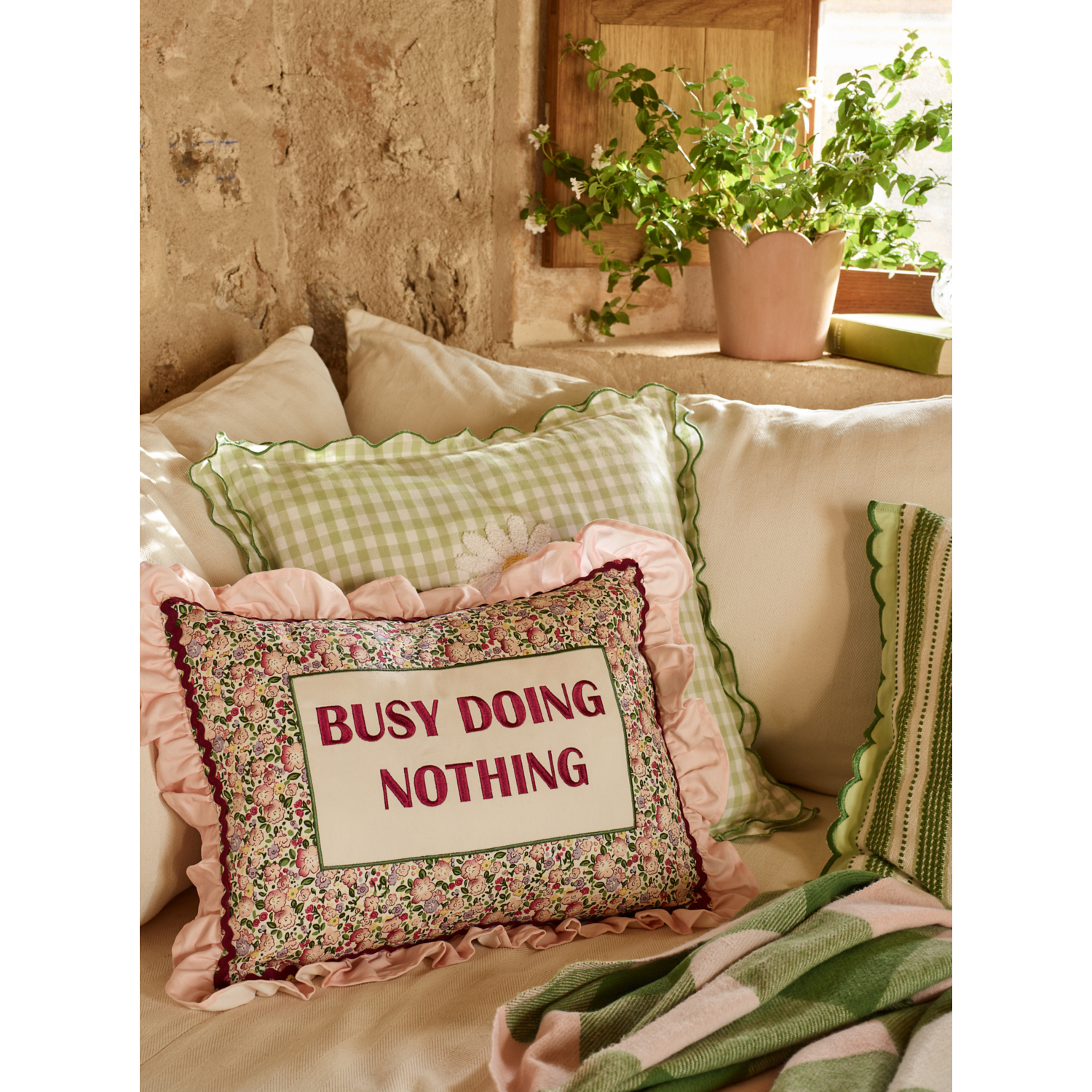 George Purple 'Busy Doing Nothing' Slogan Embroidered Cushion