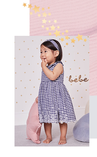 Dress your little one in this blue gingham dress