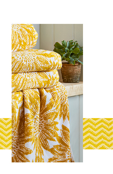 Brighten up the bathroom with yellow floral towels