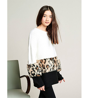 This gorgeous jumper has a faux fur panel and trims