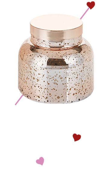 Fill your home with a bit of sparkle with this scented candle, coming in a dappled jar topped with a gold-toned lid