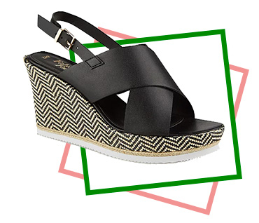 These black woven chevron wedges have a gold buckle and a cross-strap front