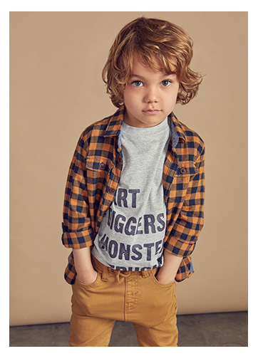 Kit them out in style with a checked shirt, slogan T-shirt and trousers