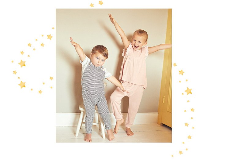 Billie Faiers's son and daughter in dance poses, both wearing Billie Faiers clothing