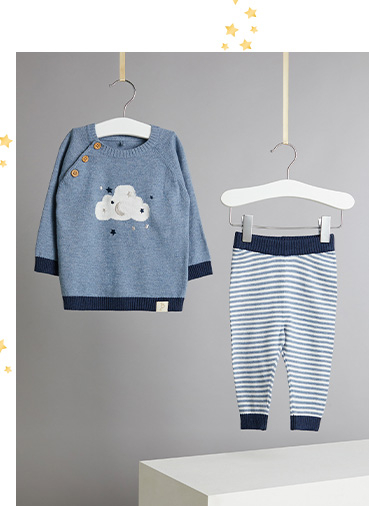 Product shot of blue cloud print top and striped bottoms on hangers