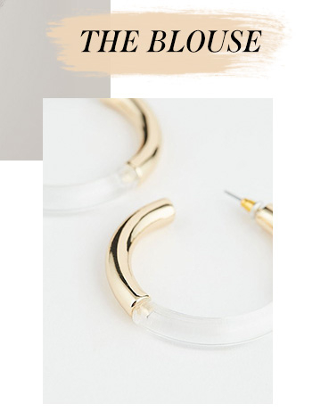 Make a statement with these gold-tone clear tube hoop earrings