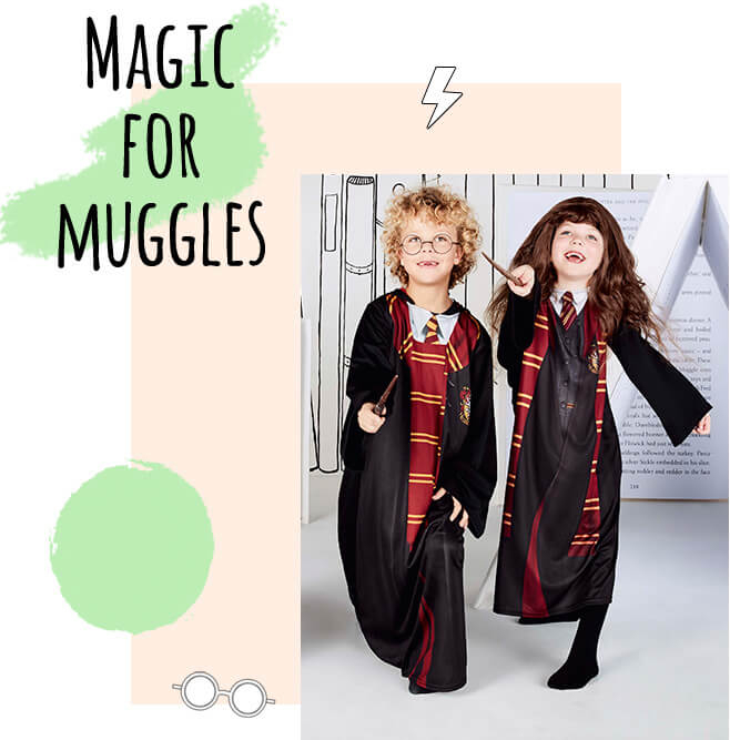 A boy and girl wearing a Harry Potter fancy dress costume 