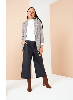 Pair dark trousers with a light top or jacket