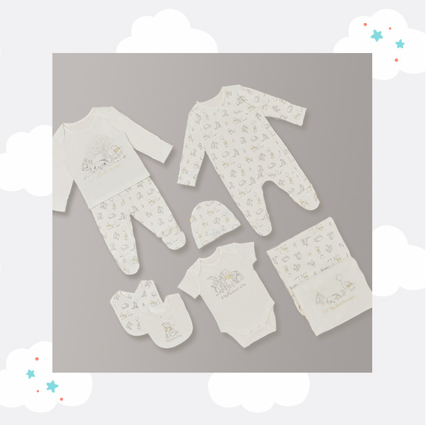 Matching Disney clothing, including an all in one, top and bottoms set, bibs and more