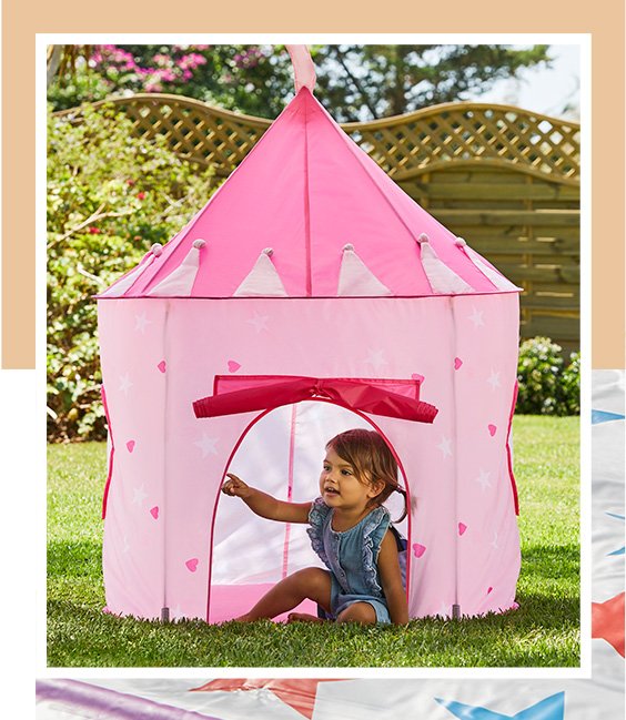 Pink pop up castle tent with child playing inside