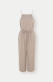 Channel head-to-toe neutrals in a jumpsuit