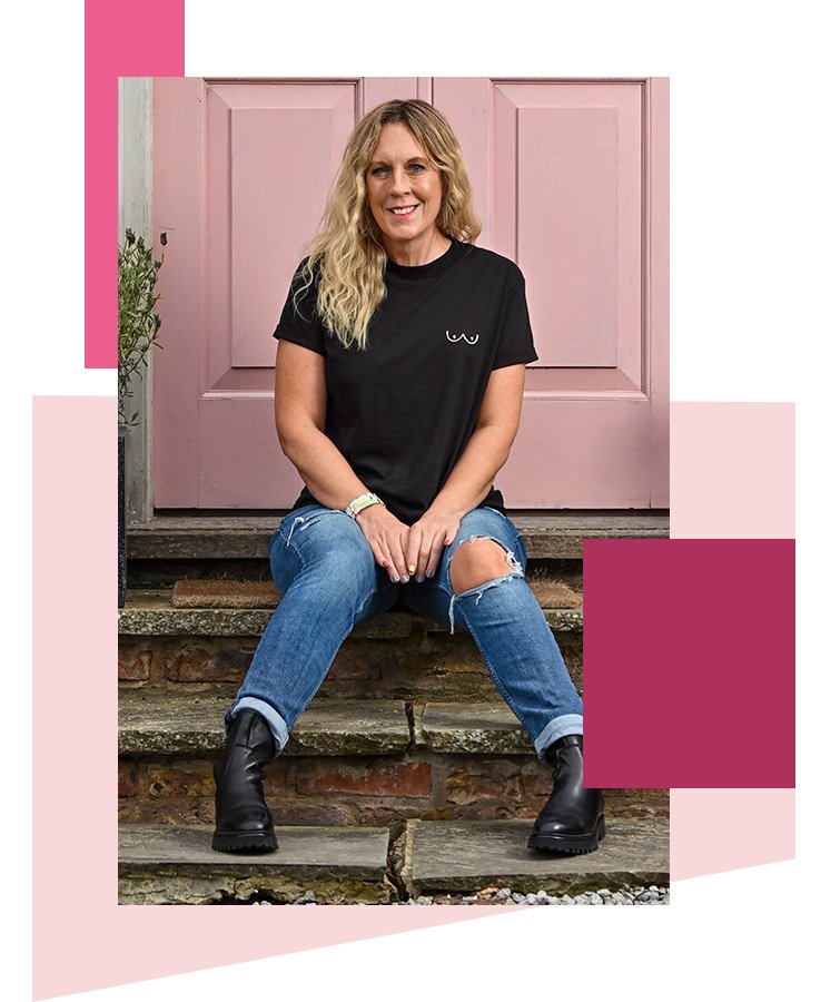 Lisa Dawson sits on steps outside pink door wearing black CoppaFeel! t-shirt, jeans and boots.