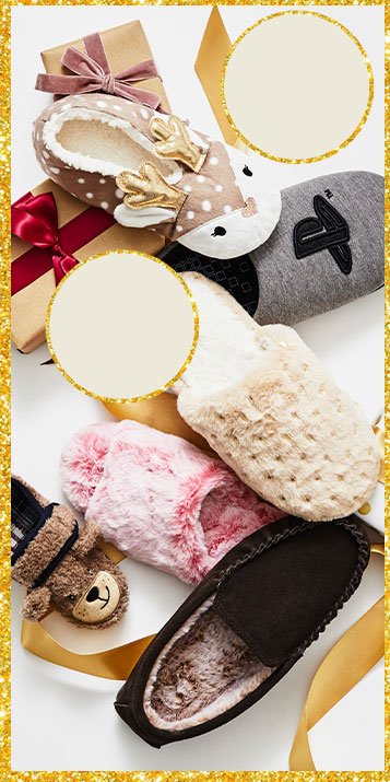 A selection of slippers on a white background surrounded by wrapped presents and festive ribbon. 