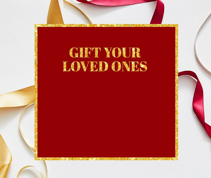 Festive red and gold ribbon on a white background. 