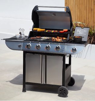 Silver tone Uniflame classic 4 burner and side gas barbecue on a garden patio.