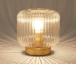 Lit gold and glass table lamp