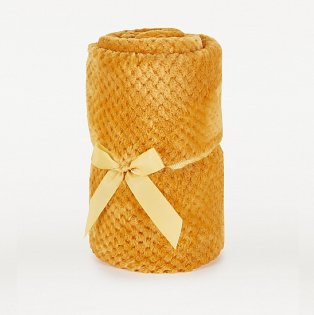 Yellow blanket tied with a yellow ribbon.