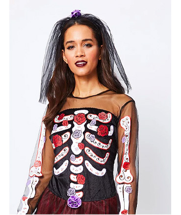 Woman wearing George Day of the Dead Halloween costume