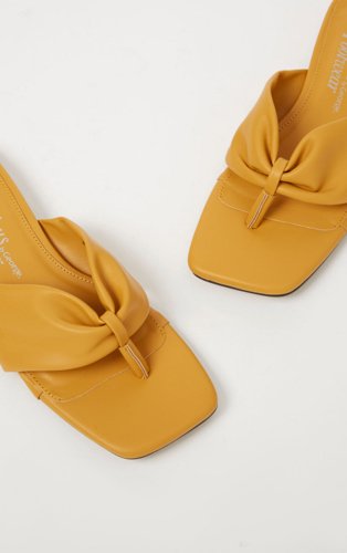 Ochre ruched toe post sandals.