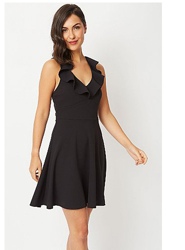 Woman wearing black frill plunge skater dress