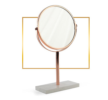 This fantastic copper mirror comes with a slim stand and swivel function