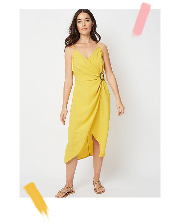 Wonderfully floaty and full of elegant style, this wrap dress is lightweight and has a ring detail at the waist