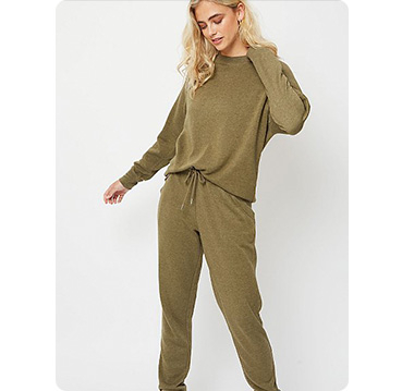 Woman wearing khaki tracksuit