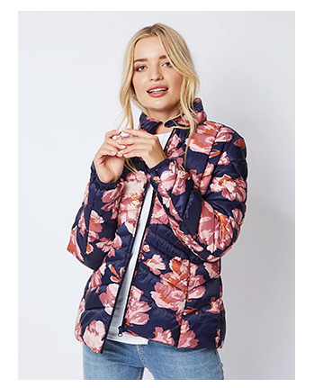 Woman wearing navy floral pac a mac 