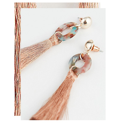 Add a bold colour to your look with these resin drop earrings, with rose-gold tassel droppings
