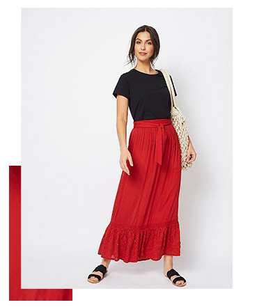 This red maxi skirt is created in a lightweight cheesecloth fabric and features a Broderie Anglaise trim