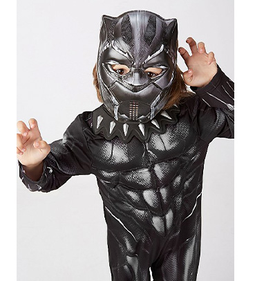 Child posing with claws up wearing a George Black Panther Halloween costume