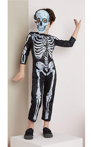 Child posing wearing a George skeleton Halloween costume and matching mask