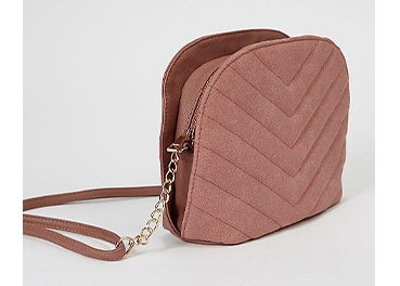 Dusty pink chevron quilted cross body bag