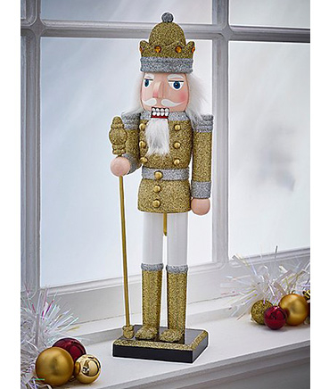 Golden nutcracker Christmas ornament